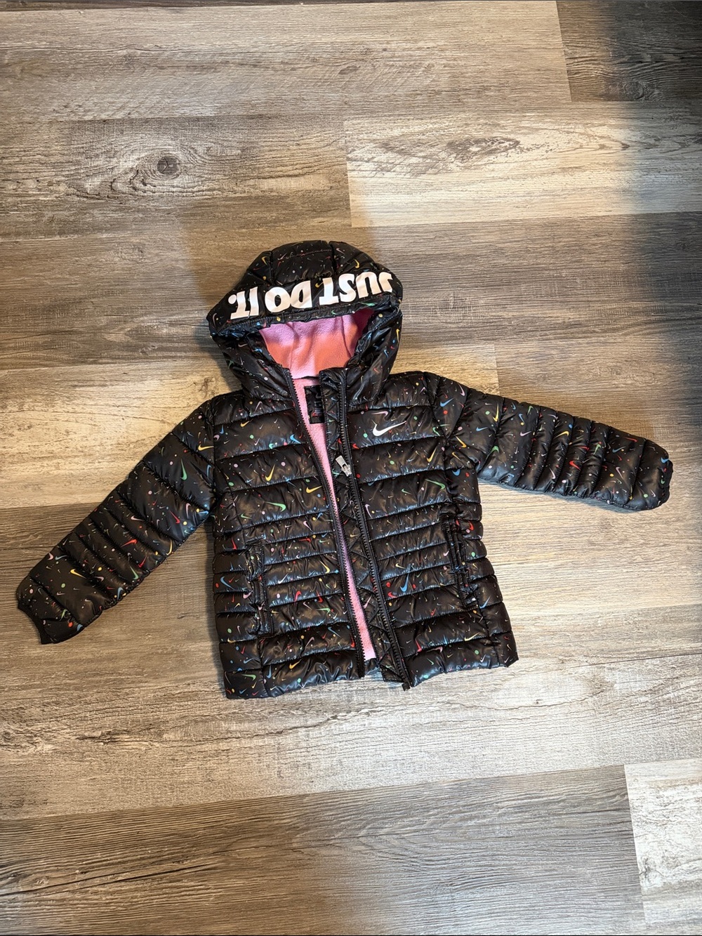 Nike Black Jacket with Pink Fleece Lining and Multicolor Swoosh Print 2t